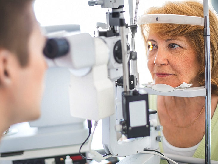 woman getting her eyes checked for glasses